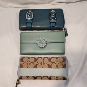 Elegant Trio of Coach Wallets in Blue, Green, and Tan